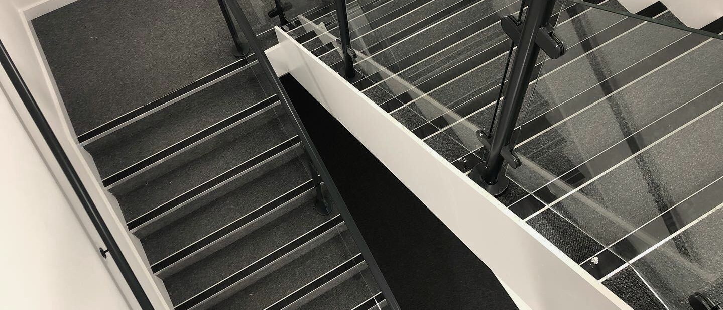 A commercial stairwell with a contrasting nosing on every tread